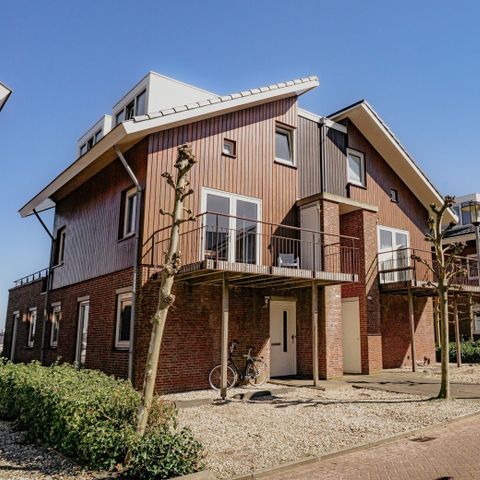 Appartement 4 personnes - Appartement familial à Uitgeest avec une grande terrasse