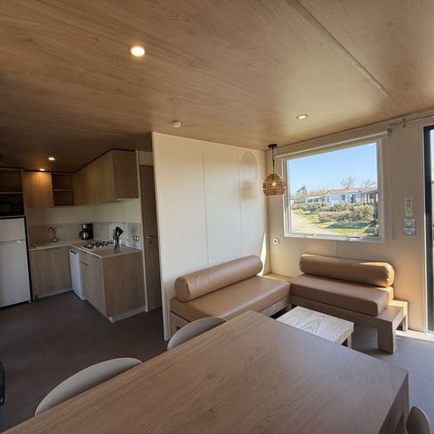 Mobilhome 4 personnes - Premium Roseau - 2chambres, climatisé, télévision, lave-vaisselle, sèche-serviette et coffre fort