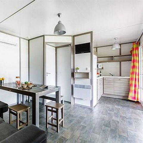 MOBILHOME 7 personnes - Chalet | Comfort XL | 3 Ch. | 5/7 Pers. | Terrasse surélevée | Clim. | TV