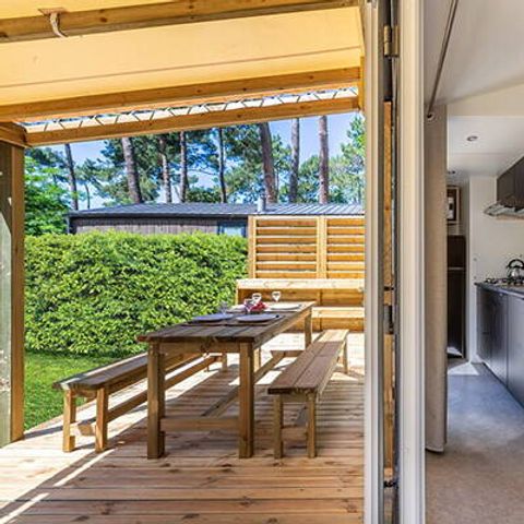 MOBILHOME 6 personnes - Mobil-home | Premium Exclusive | 3 Ch. | 6 Pers. | Terrasse surélevée | Jacuzzi | Douche extérieure | 1 SDB | Clim. | TV