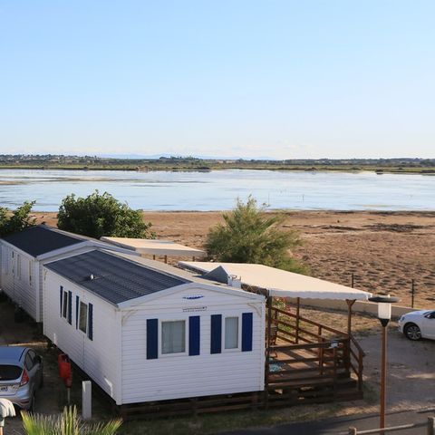MOBILHOME 4 personnes - 2 chambres bord d'etang, 23m2 catégorie 2