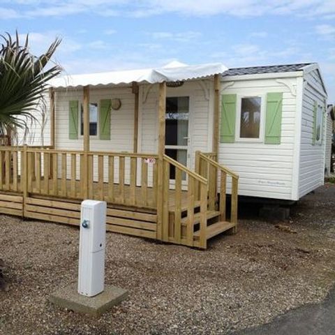MOBILHOME 4 personnes - 2 chambres bord d'etang, 23m2 catégorie 2