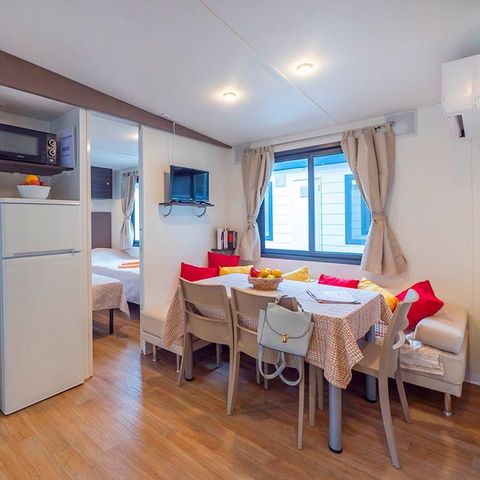 MOBILHOME 6 personnes - Premium | 3 Ch. | 6 Pers. | Terrasse surélevée | Clim. | TV