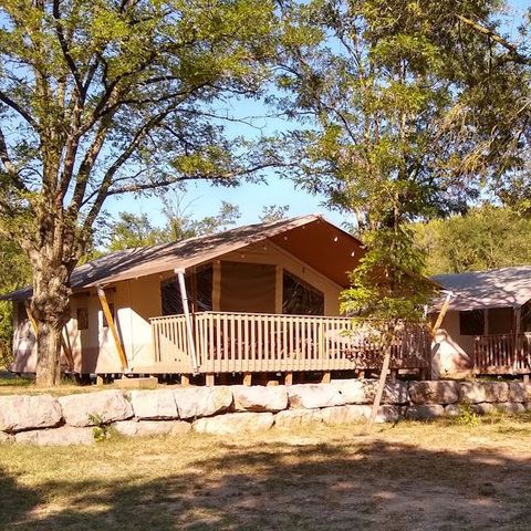 Tente en toile et en bois 5 personnes - Tente safari coucher de soleil + sanitaires + air conditionné (6P)