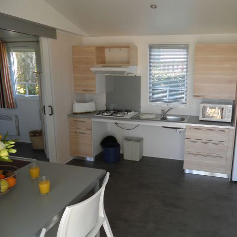 MOBILHOME 4 personnes - Standard 32m² - 2 chambres + terrasse non-couverte - PMR
