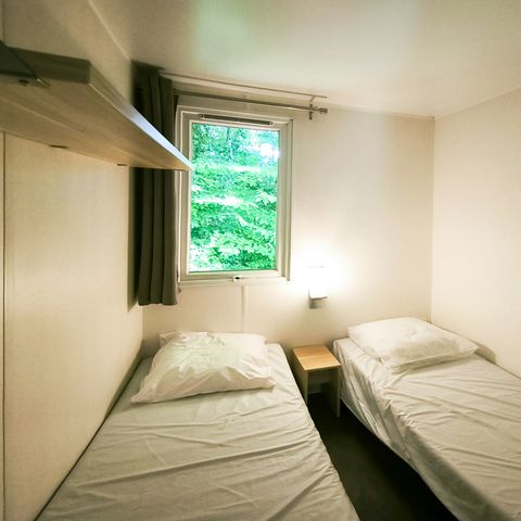 MOBILHOME 4 personnes - Confort 32m² - 2 chambres + terrasse couverte 12m² + TV + Clim -