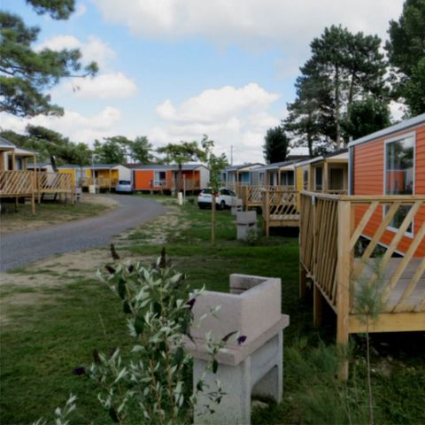 MOBILHOME 4 personnes - MOBIL HOME CONFORT DIM  plaque gaz refrigérateur  vaisselle télévision