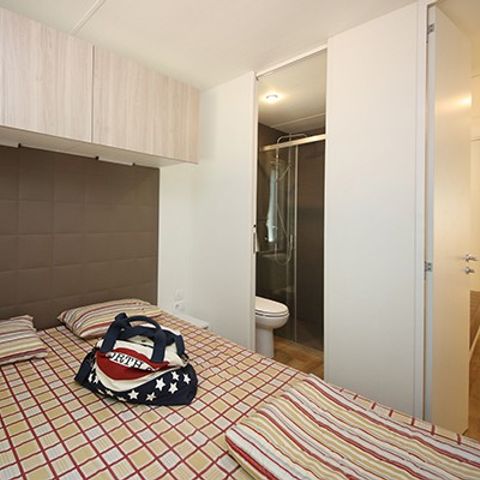 Mobilhome 4 personnes - Mobil-home | Comfort XL | 2 Ch. | 4 Pers. | Terrasse surélevée | Clim.