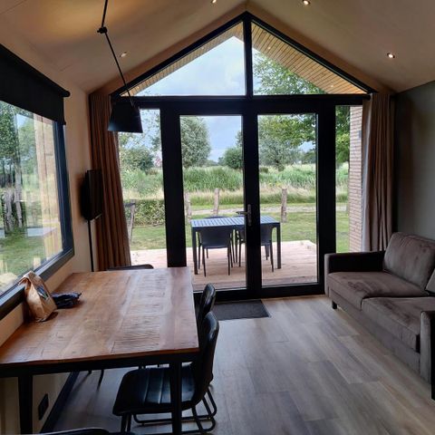 HÉBERGEMENT INSOLITE 24 personnes - Chambre de groupe la Strandhuis + 6 Tiny Houses (24 personnes)