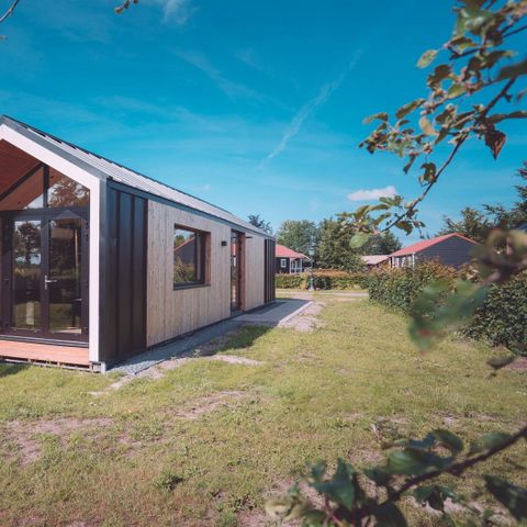 HÉBERGEMENT INSOLITE 24 personnes - Chambre de groupe la Strandhuis + 6 Tiny Houses (24 personnes)