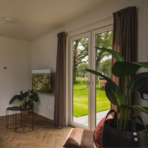 Lodge 2 personnes - Panorama Wellness Lodge : bain à remous, sauna et baignoire
