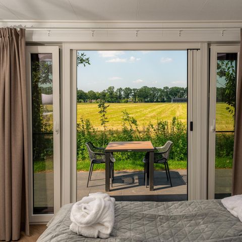 Lodge 2 personnes - Panorama Wellness lodge | jacuzzi, sauna et douche solaire