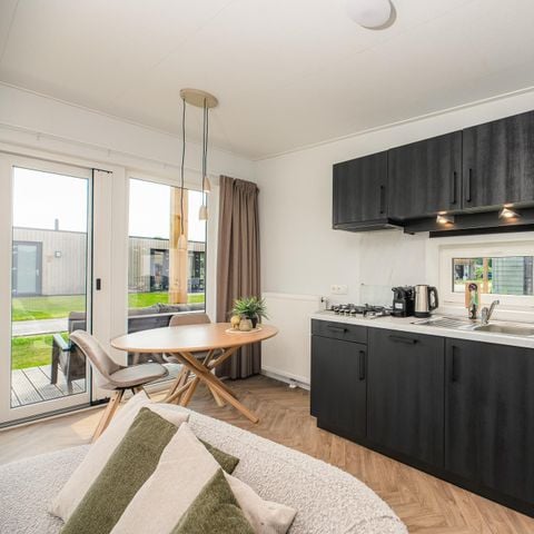 Lodge 2 personnes - Panorama Wellness lodge | jacuzzi, sauna et douche solaire