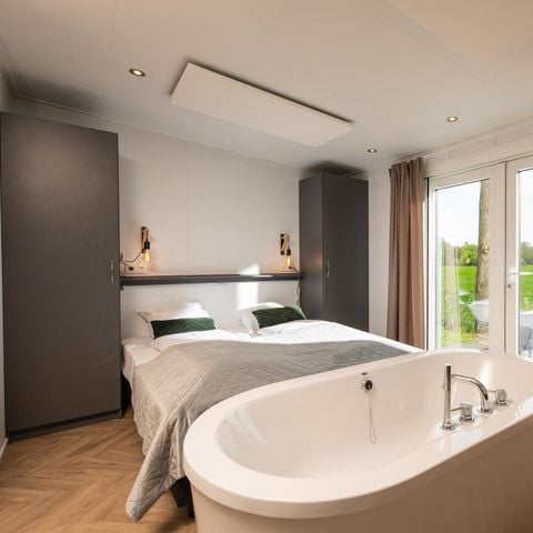 Lodge 2 personnes - Panorama Wellness Lodge - jacuzzi, sauna et baignoire