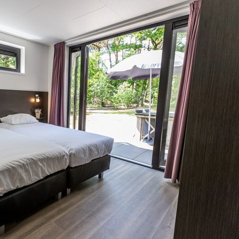 BUNGALOW 4 personnes - Forest Lodge 75 avec bain à remous