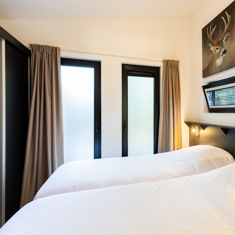 BUNGALOW 4 personnes - Forest Lodge 55 Eco avec bain à remous ou jacuzzi et sauna