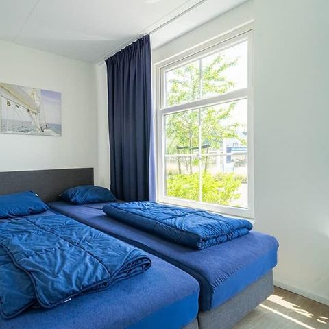 MAISON 12 personnes - Pièce commutée
