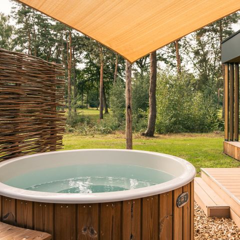 Lodge 2 personnes - Pavillon d'eau avec bain à remous