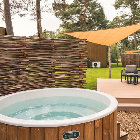 Lodge 2 personnes - Spa avec bain à remous et sauna intérieur